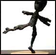 GINGERBREAD BOY - 1997 - Bronze from coral - 11" x 10" x 5" - (Edition of 6)